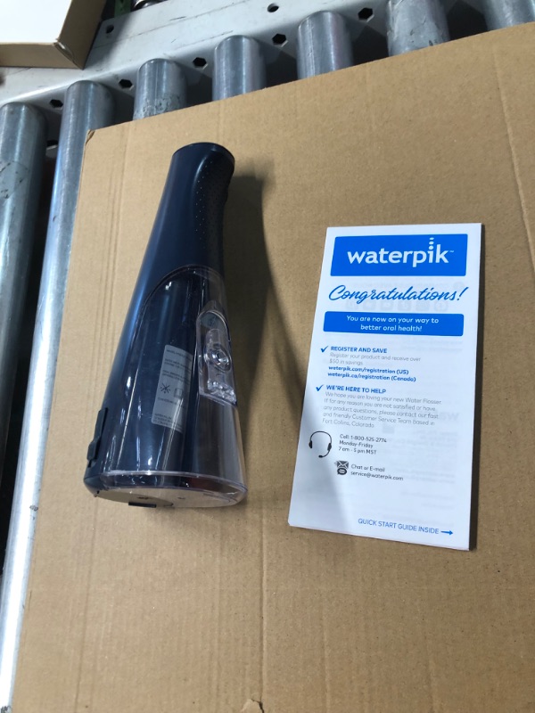 Photo 1 of ***INCOMPLETE - MISSING MOST OF THE PARTS - SEE PICTURES***
Waterpik Cordless Pulse Rechargeable Portable Water Flosser for Teeth, Gums, Braces Care and Travel with 2 Flossing Tips, Waterproof, ADA Accepted, WF-20 Blue, Packaging May Vary