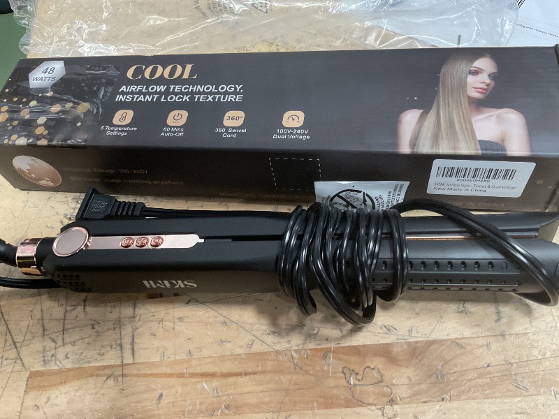 Photo 1 of SKIMI Airflow Styler, Titanium Flat Iron Hair Straightener, Professional Curling Iron with Cooling Air Vents to Lock in Style, 5 Temps & Dual Voltage, Auto Off(Black & Champagne).