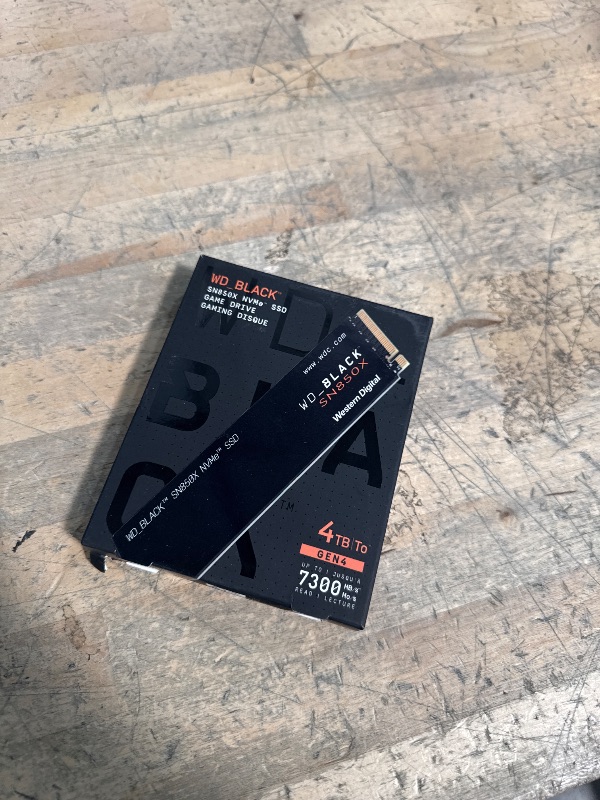 Photo 1 of *UNKNOWN IF USED* WD_BLACK 4TB SN850X NVMe Internal Gaming SSD Solid State Drive - Gen4 PCIe, M.2 2280, Up to 7,300 MB/s - WDS400T2X0E