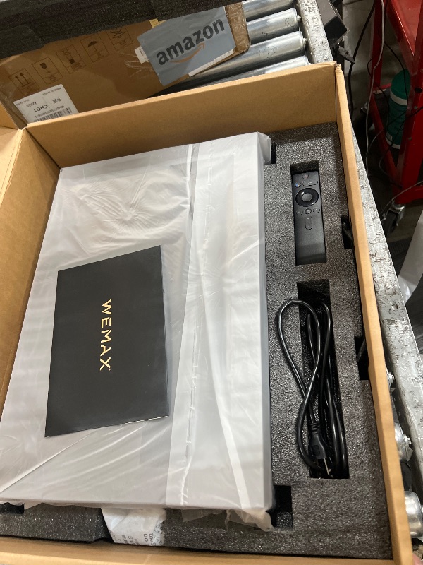 Photo 1 of ***PARTS ONLY ITEM/ISSUE WITH HOW IT FUNCTIONS*** WEMAX Nova 4K UHD Ultra Short Throw Projector, 150" ALPD Laser TV with Smart Android TV, HDR10 Home Theater, Dolby Audio DTS-HD, UST Projector for Movie, WiFi Bluetooth, Built in Google Assistant