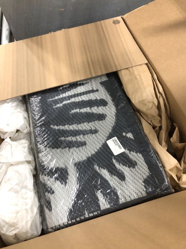 Photo 1 of MontVoo Outdoor Rug 9x12 Waterproof Patio Rug-Outdoor Carpet Mat Reversible Plastic Straw Outside Outdoor Rug for RV Camping Picnic Beach Balcony Backyard Pool Deck Porch Farmhouse Floral Black