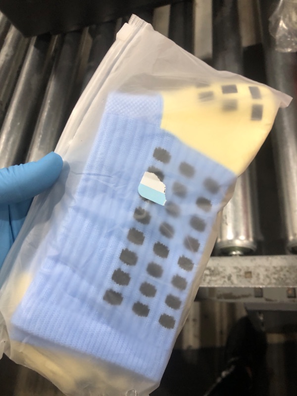Photo 1 of 1 pair of socks (blue/yellow) grip/slip resistant 