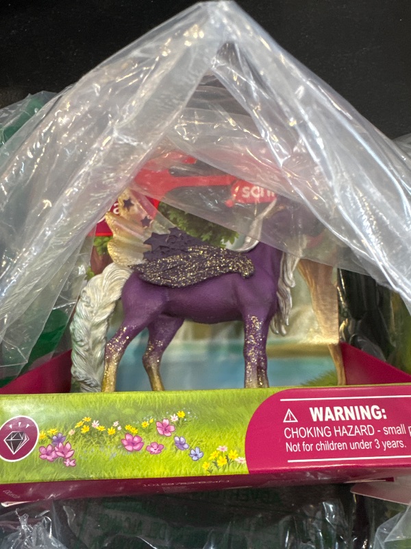 Photo 1 of Schleich bayala Star Unicorn Flying Pegasus Figurine - Fantastic Purple and Gold Unicorn Fantasy Figurine, Bring Smile and Joy, Gift for Boys and Girls, Fans of Fantasy, Kids Age 5+