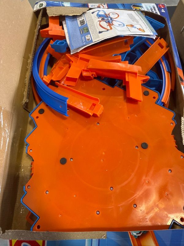 Photo 1 of Hot Wheels Toy Car Track Set, Criss Cross Crash with 1:64 Scale Vehicle, Powered by a Motorized Booster