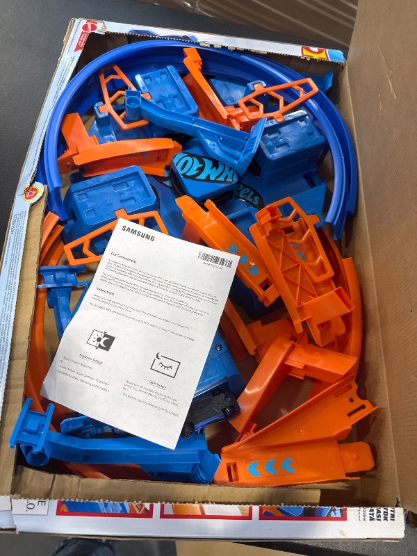Photo 1 of Hot Wheels Toy Car Track Set, Criss Cross Crash with 1:64 Scale Vehicle, Powered by a Motorized Booster