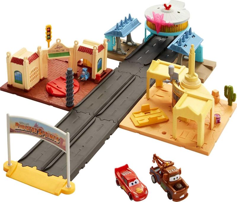 Photo 1 of Mattel Disney and Pixar Cars On The Road Playset with 2 Toy Vehicles & Light-Up Countdown, Includes Lightning McQueen & Mater Truck
