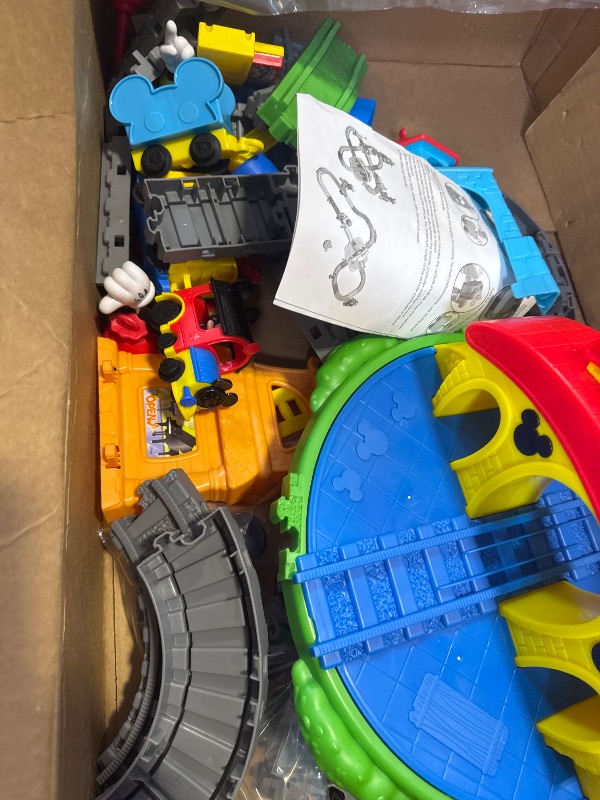 Photo 1 of Disney Junior Mickey Mouse Around Town Track Set, 35-piece Remote Control Toy Train, Officially Licensed Kids Toys for Ages 3 Up, Amazon Exclusive
