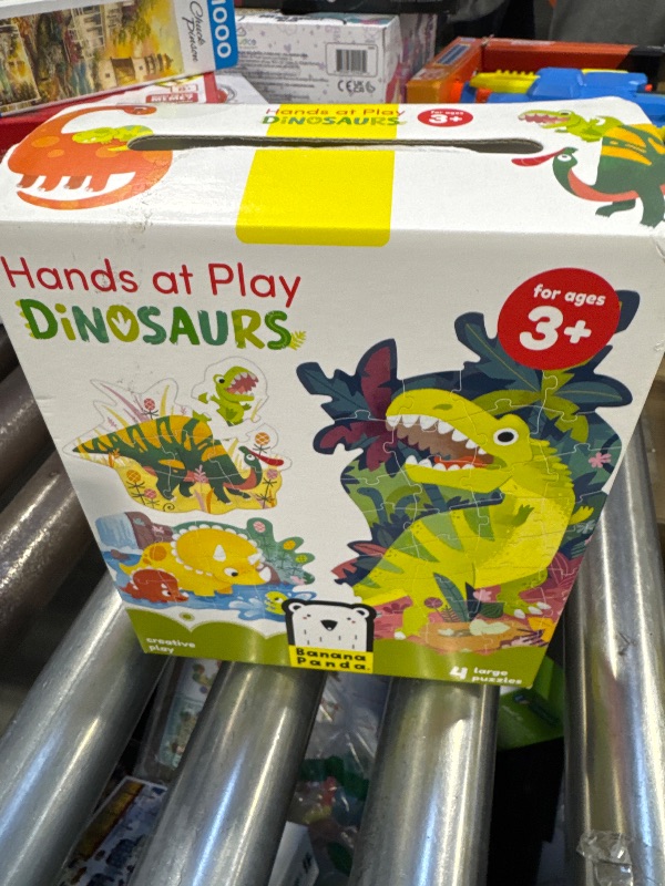 Photo 1 of Banana Panda Hands at Play Dinosaur Puzzle Set - Includes 4 Large Progressive Jigsaw Puzzles with 71 Total Pieces - Develop Fine Motor Skills and Learn About Dinosaurs - for Kids Ages 3-5 Years
