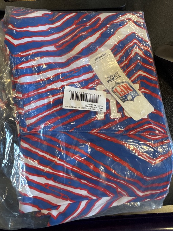 Photo 1 of Zubaz NFL Women's Basic Zebra Print Legging, New York Giants, Medium Team Color