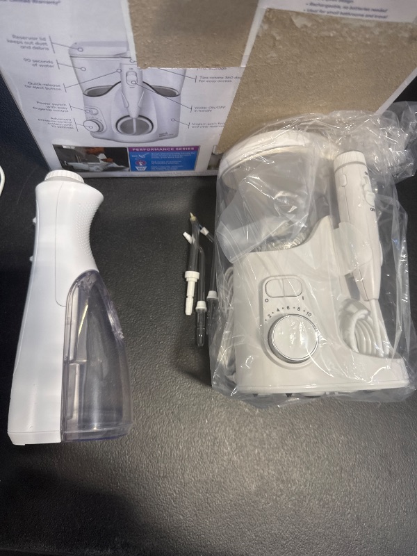 Photo 1 of Waterpik Ultra Plus and Cordless Pearl Water Flosser Combo Pack