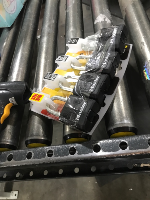 Photo 1 of Master Lock Black Outdoor Key Lock, Heavy Duty Weather Resistant Padlock with Cover, Keyed Alike Padlocks for Outdoor Use, 4 Pack, M115XQLF