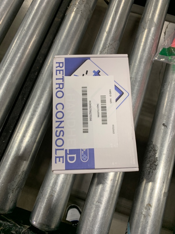 Photo 1 of R36S Handheld Game Console 3.5-inch Retro Handheld Video Games Consoles Built-in Battery Portable Style Hand Held System White