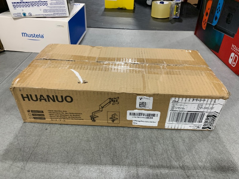 Photo 1 of HUANUO Single Monitor Mount for 13-32 inch, Adjustable Gas Spring Monitor Arm, 4.4-22lbs Screen, Monitor Stand with VESA Mount 75x75/100x100, C-Clamp/Grommet Base