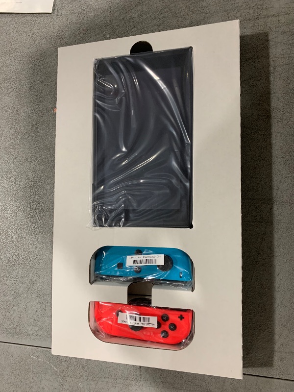 Photo 3 of Nintendo Switch with Neon Blue and Neon Red Joy?Con