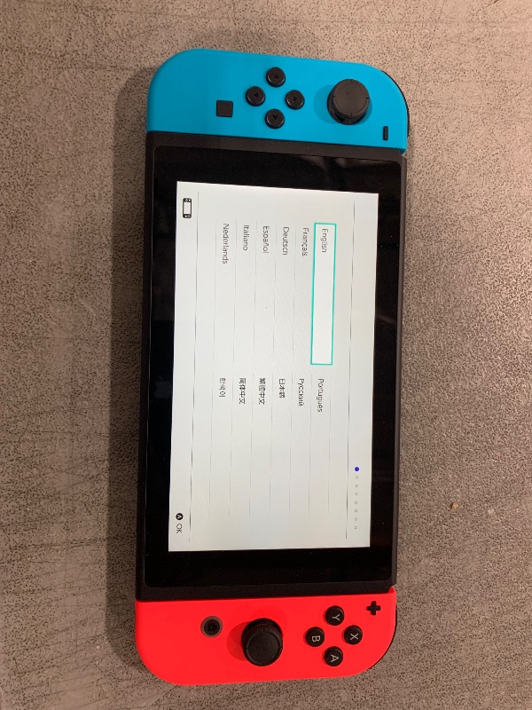 Photo 2 of Nintendo Switch with Neon Blue and Neon Red Joy?Con