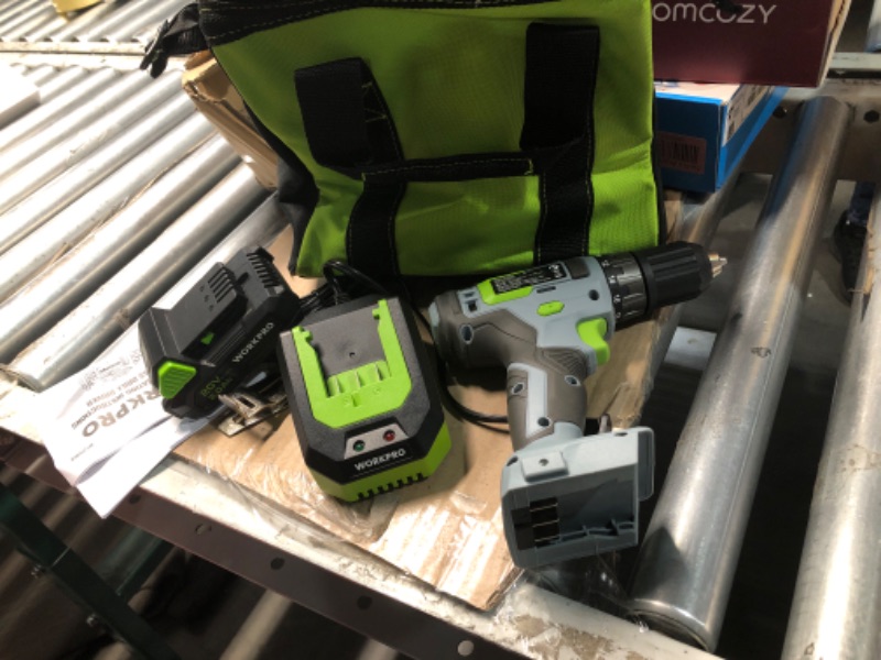 Photo 1 of **CHARGER DOES NOT WORK**WORKPRO 20V Cordless Drill Driver Kit, 3/8'' Keyless Chuck, 2.0 Ah Li-ion Battery, 1 Hour Fast Charger and 11-inch Green Storage Bag Included