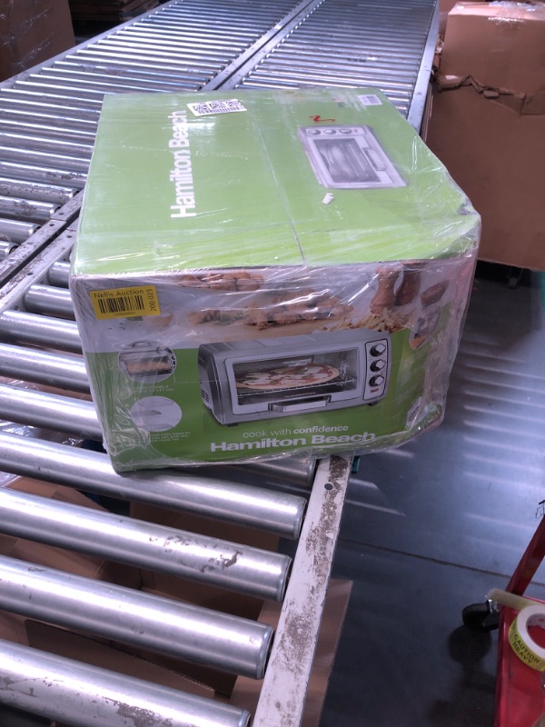 Photo 1 of ***FACTORY SEALED BOX SLIGHTLY DAMAGED FRTOM SHIPPING***Hamilton Beach Air Fryer Toaster Oven Combo with Large Capacity, Fits 6 Slices or 12” Pizza, 4 Cooking Functions for Convection, Bake, Broil, Roll-Top Door, Easy Reach Sure-Crisp, Stainless Steel
