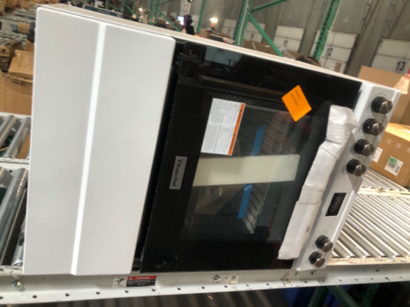 Photo 6 of ***HEAVY PICKUP/USED/DAAM THROUGHOUT**MAGIC CHEF 24 in 4-Burner Freestanding Gas Range in White


