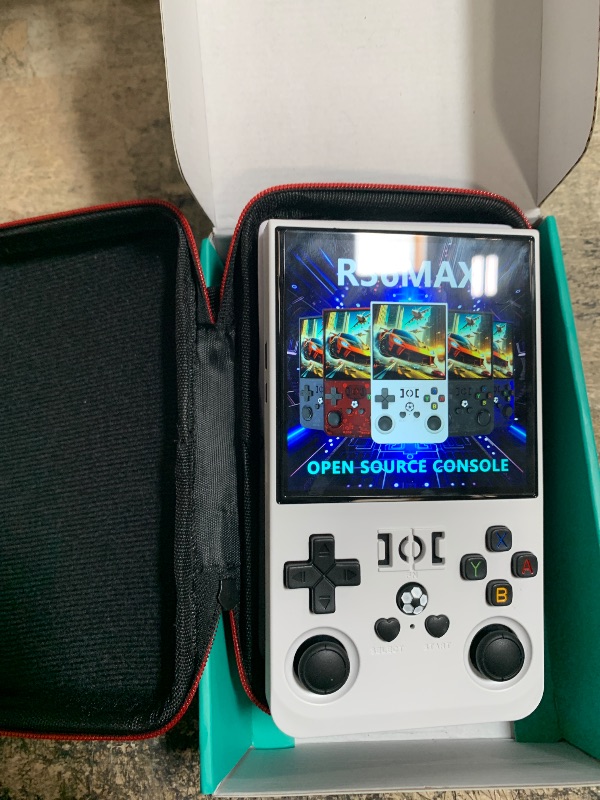 Photo 1 of (SEE NOTES BEFORE BIDDING) R36MAX Retro Handheld Game Console, 18000+ HD Games Mini Retro Video Console, 4.0 Inch IPS Screen,, Portable Arcade Video Gaming Console Gift for Adults Kids, White