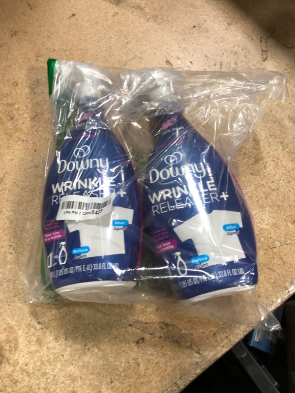 Photo 1 of Downy Wrinkle Releaser Spray, All In One Wrinkle Release Spray, Odor Eliminator, Static Remover, Fabric Refresher & Ironing Aid for Clothes, 33.8 Fl Oz (Pack of 2), Light Fresh Scent