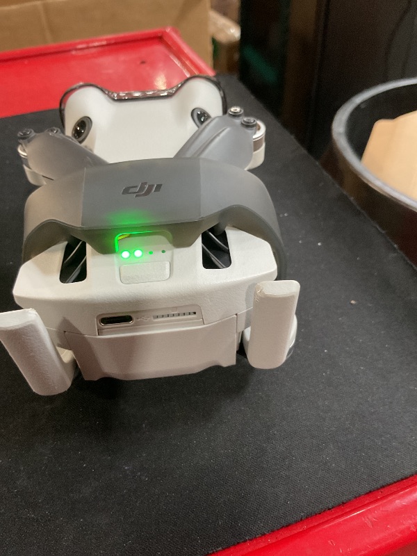 Photo 1 of ***SEE NOTES*** 
DJI Mini 4 Pro Fly More Combo Plus with DJI RC 2, Drones with Camera for Adults 4K, 3 Intelligent Flight Battery Plus for up to 135 Mins Flight Time, Smart Return to Home, Drone for Beginners