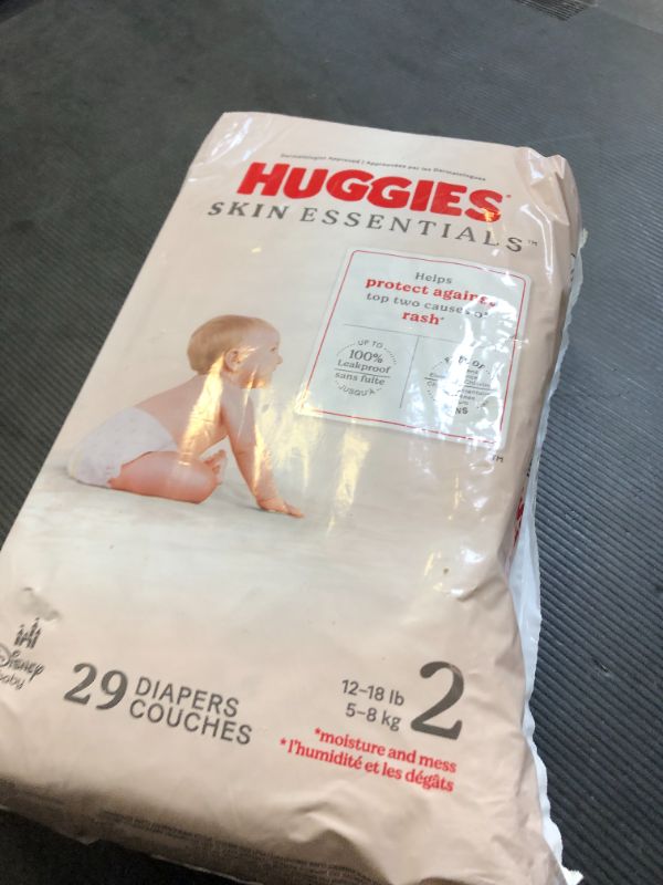 Photo 1 of Huggies Size 2 Diapers, Skin Essentials Baby Diapers, Size 2 (12-18 lbs), 29 Count, Packaging May Vary