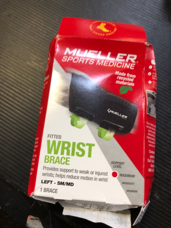 Photo 1 of MUELLER Sports Medicine Green Fitted Wrist Brace, Wrist Pain Relief Support for Men and Women, Ideal for Carpal Tunnel, Tendinitis, Arthritis, Left Hand, Black, Small/Medium