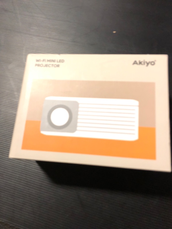 Photo 1 of Mini Projector with WiFi and Bluetooth, 1080P Supported Projector with Projector Stand, Portable Movie Projector for Home Theater/Outdoor, Compatible with iOS/Android/Laptop/TV Stick/HDMI/PS5