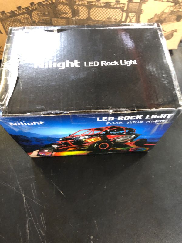Photo 1 of Nilight RGB LED Rock Lights Kit, 4 pods Underglow Multicolor Neon Light Pod with Bluetooth App Control Flashing Music Mode Wheel Well Light for Truck ATV UTV RZR SUV