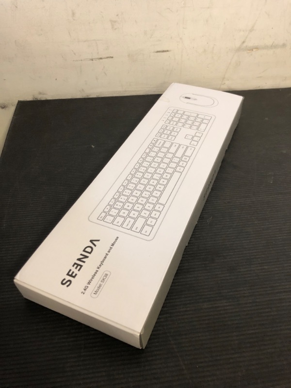 Photo 1 of Wireless Keyboard and Mouse Combo - Full Size Slim Thin Wireless Keyboard Mouse with Numeric Keypad 2.4G Stable Connection Adjustable DPI (White & Silver)