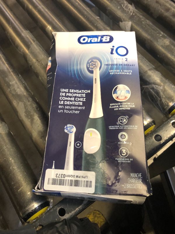 Photo 1 of Oral-B iO Series 2 Rechargeable Electric Powered Toothbrush Starter Kit, Forest Green with 2 Brush Heads - Automatic Pressure Sensor to Protect Gums - 3 Modes - 2 Min Timer