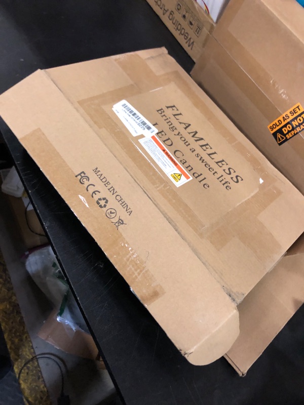 Photo 1 of Nimiko Flameless Candles with Remote, Battery Operated Flickering Flameless Candles, LED Candles with Timer 2/4/6/8H, with Realistic LED Candles Set of 9 (D3 x H 3" 4" 5" 6" 7") (Black)