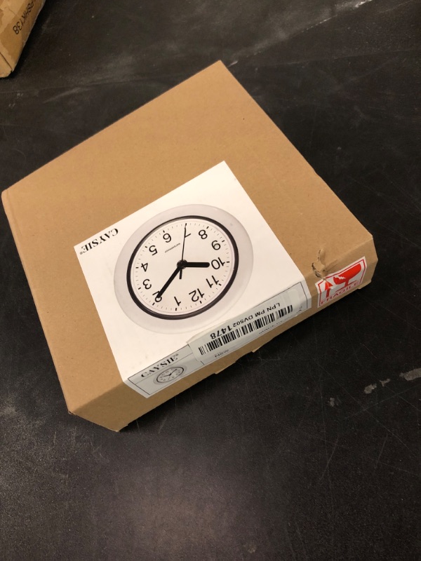 Photo 1 of Caysie 6.5 Inch Sealed Small Indoor Outdoor Clock Waterproof, Hanging or Standing Silent Battery Operated Wall Clocks for Pool Patio Bathroom Shower (White)