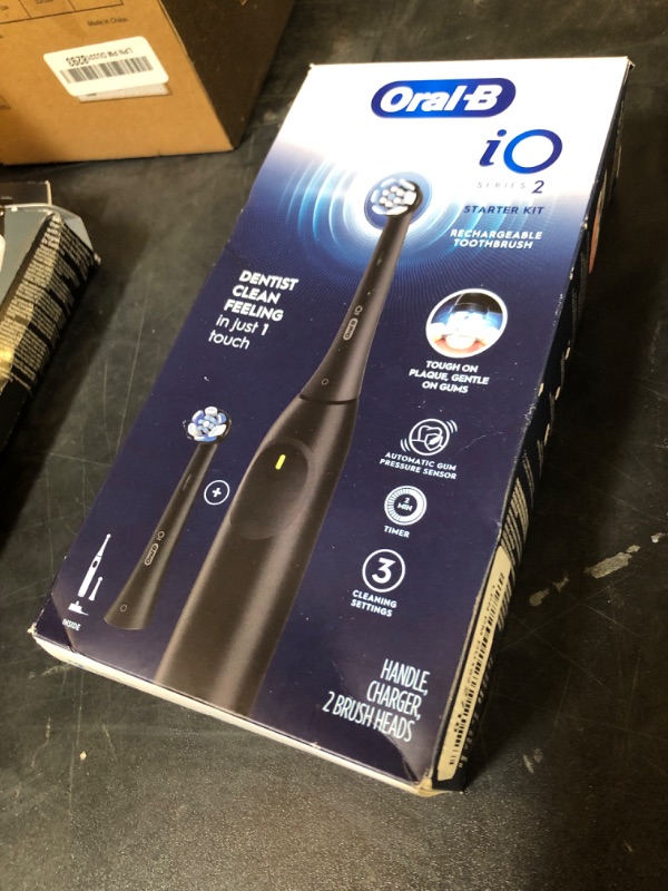 Photo 1 of Oral-B iO Series 2 Rechargeable Electric Powered Toothbrush Starter Kit, Night Black with 2 Brush Heads - Automatic Pressure Sensor to Protect Gums - 3 Modes - 2 Min Timer