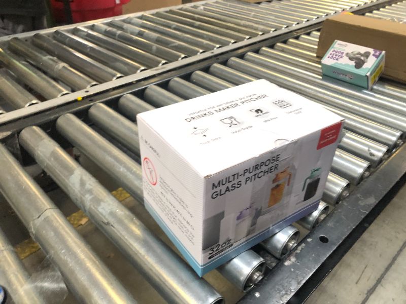 Photo 1 of JunVpic Breast Milk Pitcher Jug - 32 oz Glass Mason Jar Airtight Pitcher with Pour Spout Handle for Breastmilk, Iced Tea, Ice Drinks Storage Container?Pink?