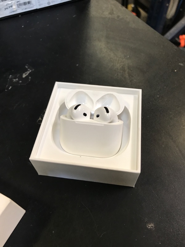 Photo 1 of Apple AirPods 4 Wireless Earbuds, Bluetooth Headphones, with Active Noise Cancellation, Adaptive Audio, Transparency Mode, Personalized Spatial Audio, USB-C Charging Case, Wireless Charging, H2 Chip
