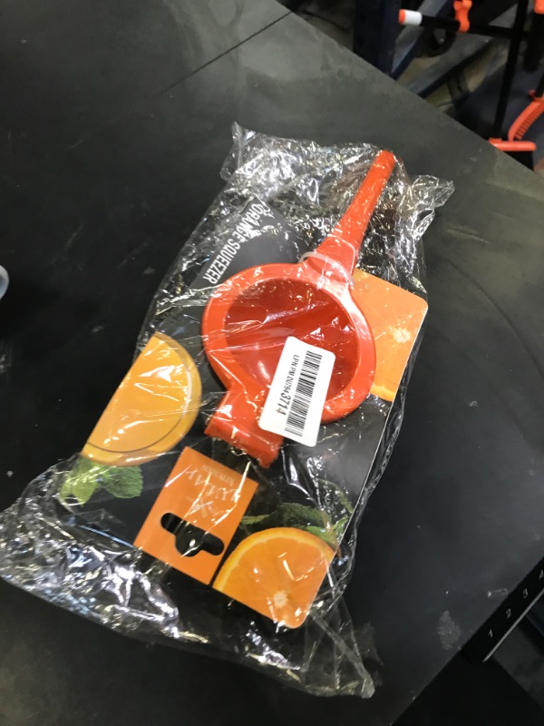 Photo 1 of Zulay Premium Quality Metal Orange Squeezer, Citrus Juicer, Manual Press for Extracting the Most Juice Possible - Orange Juicer (Orange)