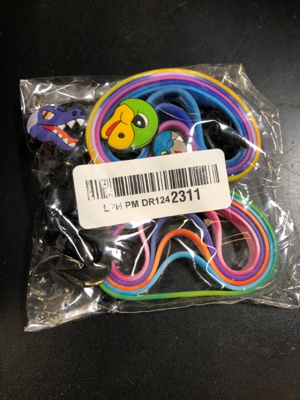 Photo 1 of DMIGHT Dinosaur Party Favors, 30 Slap Bracelets Rubber Wristbands for Kids Boys Girls Birthday Party Favors Supplies Classroom Prize Gifts Dinosaur Goodie Bag Fillers