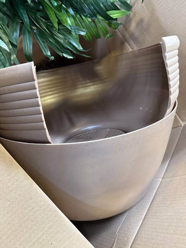 Photo 1 of ARTIFICIAL PLANT AND POT 
