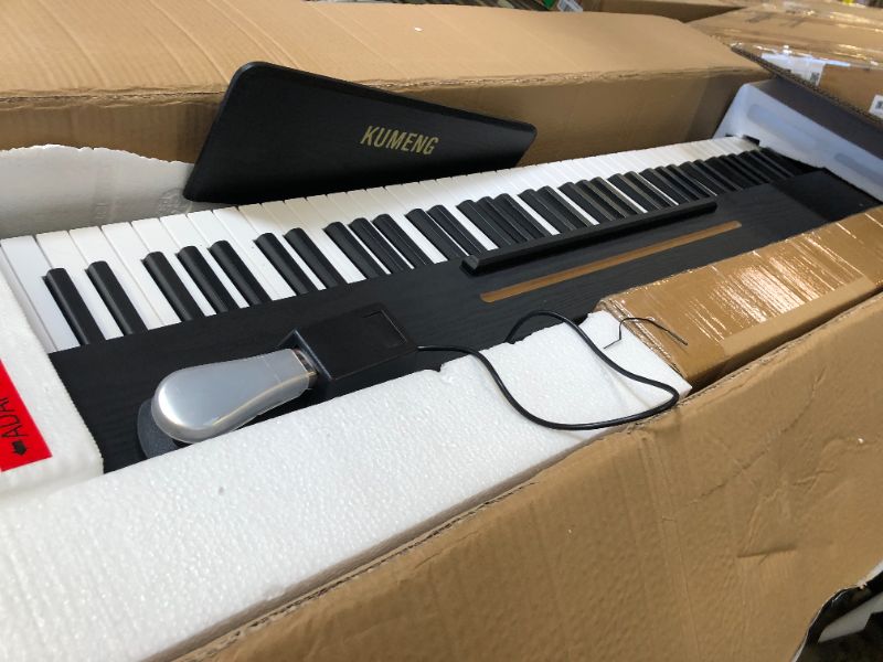 Photo 1 of KUMENG digital Piano 88 Key Semi Weighted Keyboard,Full-size Electric Piano for Beginners,with Sheet Music Stand,Pedal,Power Adapter,Headphone Mode,USB-MIDI (KU-3506 Digital Piano with Stand)