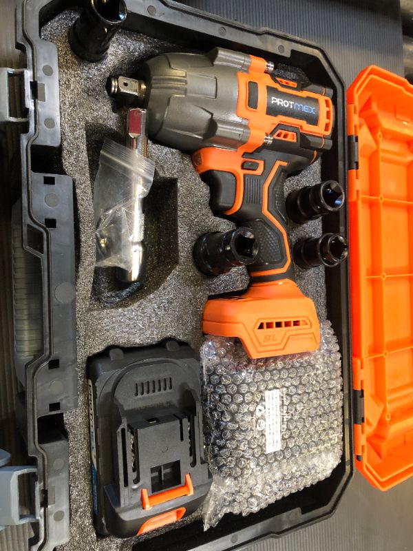 Photo 1 of Cordless Impact Wrench, 900Ft-lbs (1200N.m) 1/2" Brushless Impact Gun, 21V High Torque Power Impact Driver, 2x4.0Ah Batteries Electric Impact Motor Variable Speeds for Family Car/Pickup Truck/Mower