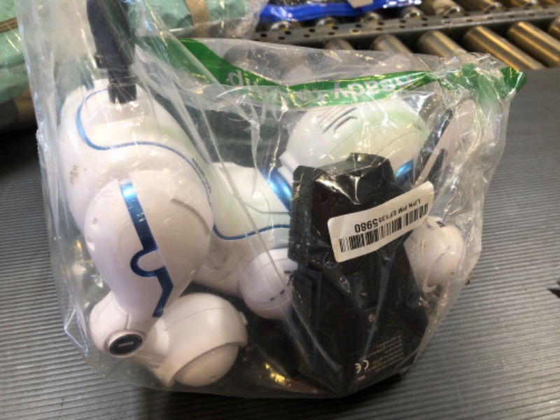 Photo 1 of Top Race Rechargeable Robot Dog- Interactive Smart Robo Dog for Kids Ages 5-7 - Programmable with Remote Control, Voice and Touch Features - Realistic Actions and Perform Tricks - 4x5x6 Inches (White)