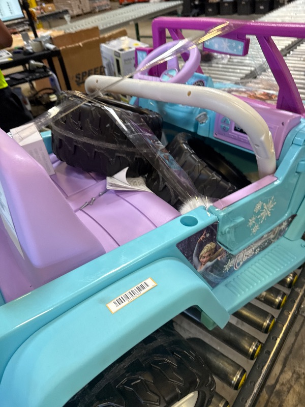 Photo 1 of 12V Power Wheels Disney Frozen Jeep Wrangler Battery-Powered Ride-On Toy Vehicle for Child Ages 3-7
