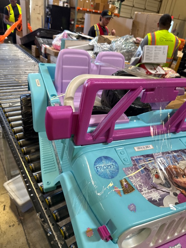 Photo 1 of 12V Power Wheels Disney Frozen Jeep Wrangler Battery-Powered Ride-On Toy Vehicle for Child Ages 3-7
