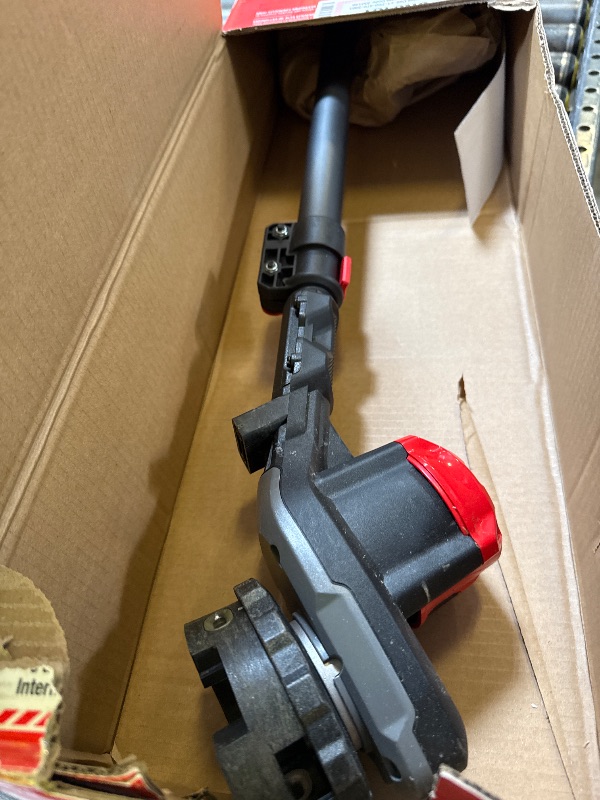 Photo 1 of CRAFTSMAN V20 WEEDWACKER Cordless String Trimmer with QUICKWIND, 4 Ah Battery, Charger, and Spool Included (CMCST920M1), Red and Black