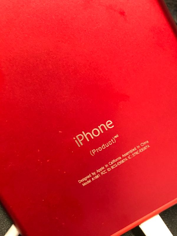 Photo 1 of Iphone 9 (Product)Red, with charger cable and charging brick/block. For parts only.