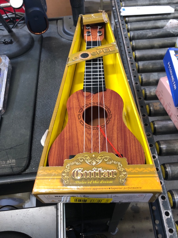 Photo 1 of Raimy 17in Kids Ukulele Guitar - 4 Strings Mini Guitar Children Musical Instruments Educational Toys with Picks for Toddler Kids Boys Girls Beginner (Mahogany)