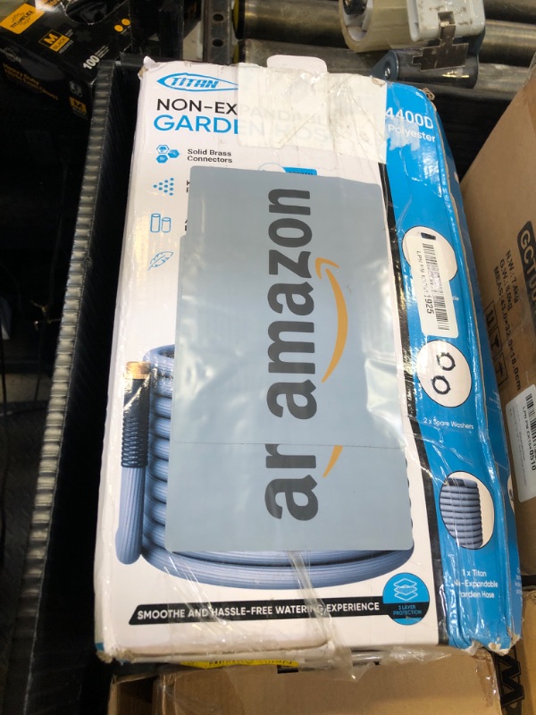 Photo 1 of TITAN Garden Hose | Flexible, Lightweight, Kink-Free & Durable Hybrid Water Hose with Heavy Duty Brass Connectors & High-Pressure Jet Nozzle (50FT x 5/8”)