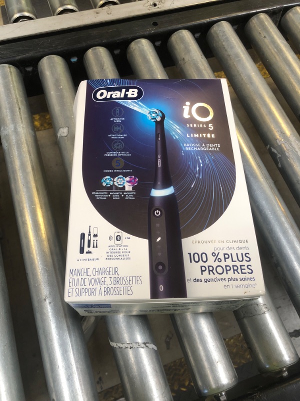Photo 1 of Oral-B iO Deep Clean + Whiten Rechargeable Electric Toothbrush with Visible Pressure Sensor, 2 Minute Timer, 5 Cleaning Settings, 1 iO5 Limited, 3 Toothbrush Heads, Travel Case & Refill Holder, Black