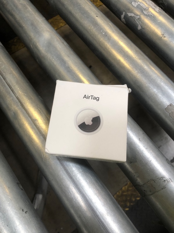 Photo 1 of Apple AirTag. Keep Track of and find Your Keys, Wallet, Luggage, Backpack, and More. Simple one-tap Set up with iPhone or iPad